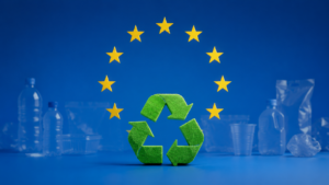 EU flag and recycling symbol representing PPWR regulation driving rPET flakes demand